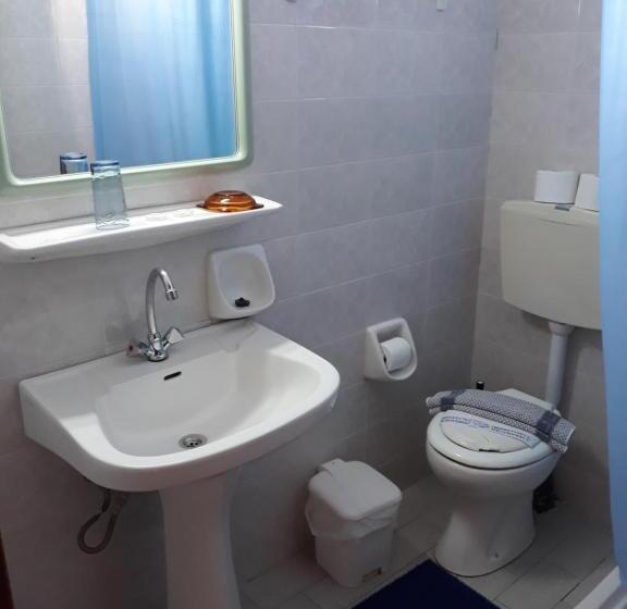 Quarto Estandar Individual, Neon