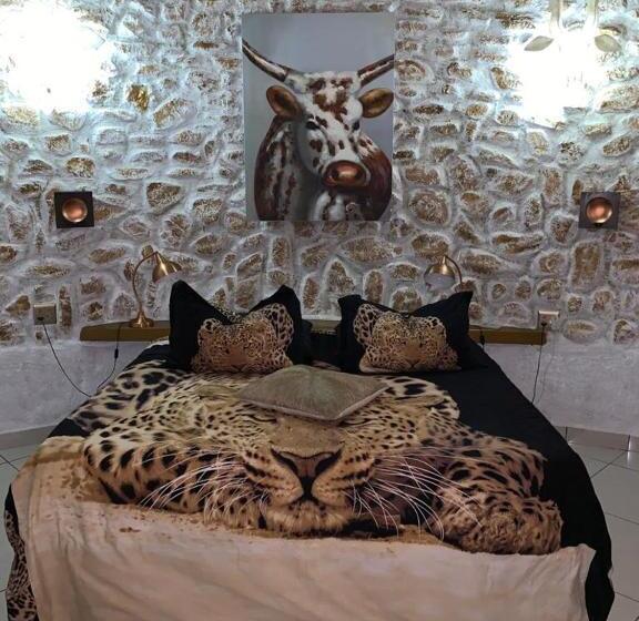 带花园景观和一个卧室的别墅, Hippomoon Lodge Game Reserve