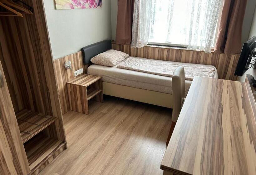 标准单人间, Am Limes