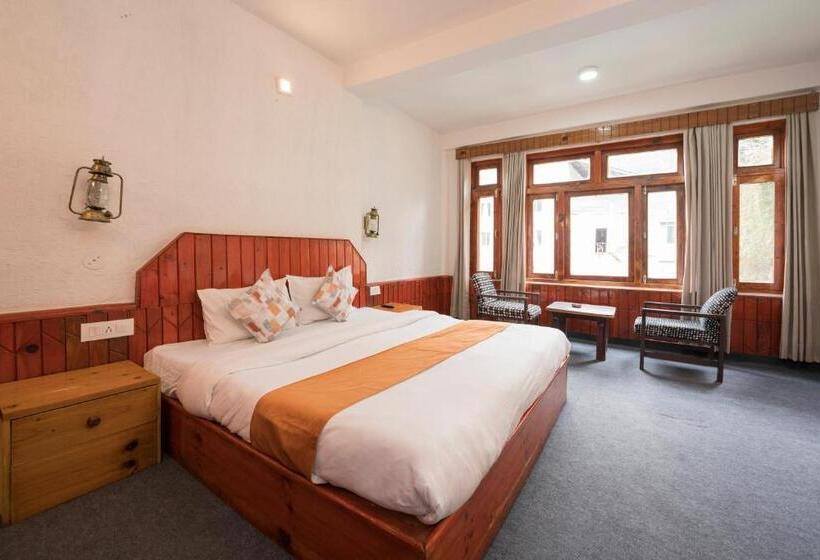 Economy Quadruple Room, The Village Manali Café, Bar & Bistro