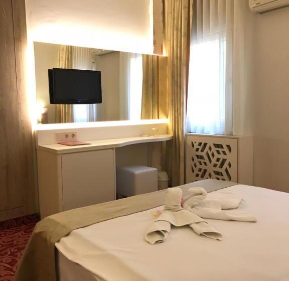 غرفة ديلوكس, Kosdere