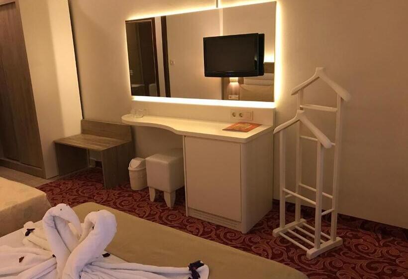 غرفة ديلوكس, Kosdere