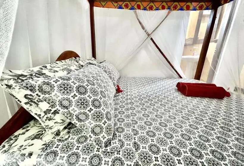 اتاق استاندارد چهارنفره با چشمانداز باغ, Chikachika Beach B&b