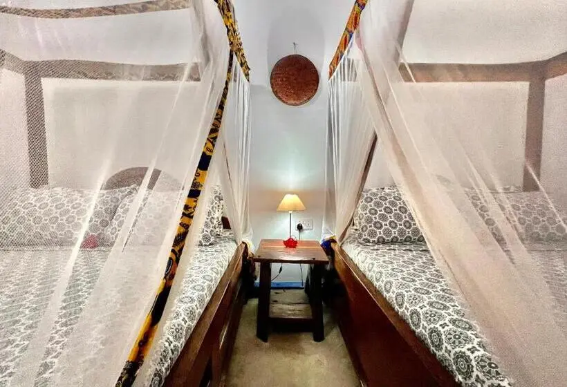 اتاق استاندارد چهارنفره با چشمانداز باغ, Chikachika Beach B&b