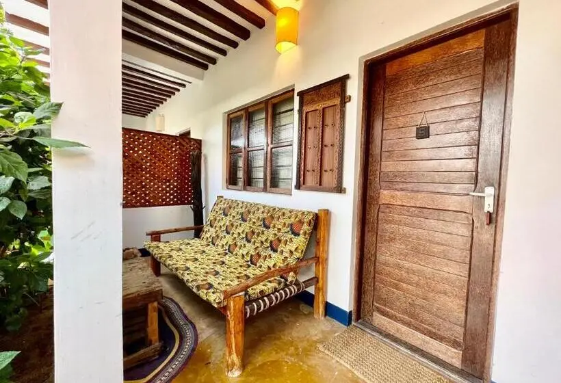 اتاق استاندارد چهارنفره با چشمانداز باغ, Chikachika Beach B&b