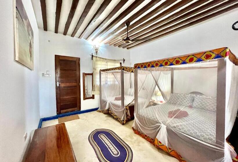 Четырехместный Номер Стандарт Вид на Сад, Chikachika Beach B&b