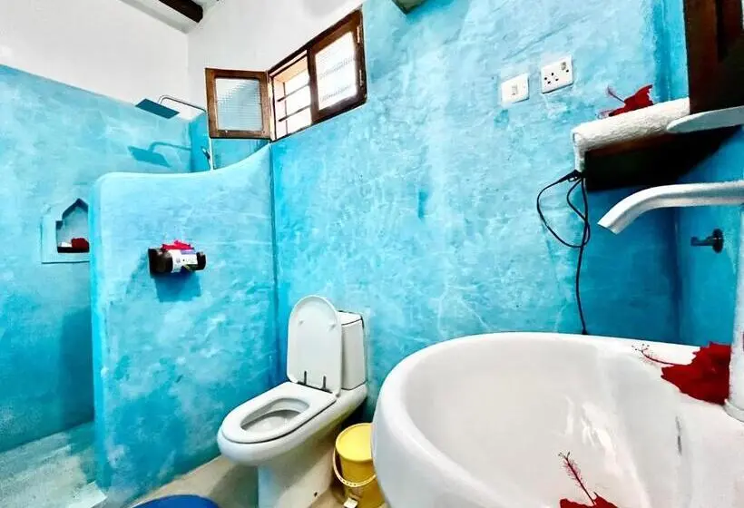 اتاق استاندارد سه تخته با چشمانداز باغ, Chikachika Beach B&b