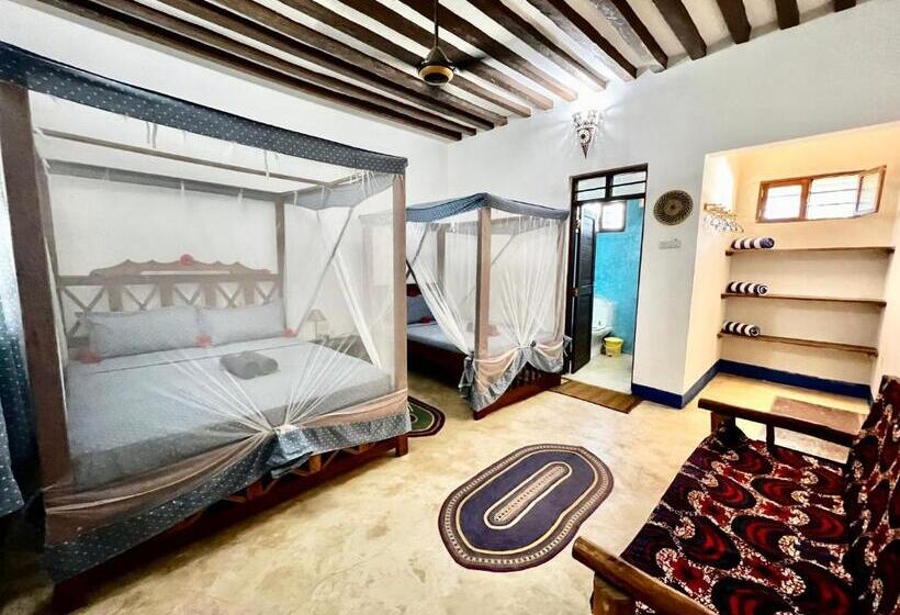 Трехместный Номер Стандарт Вид на Сад, Chikachika Beach B&b