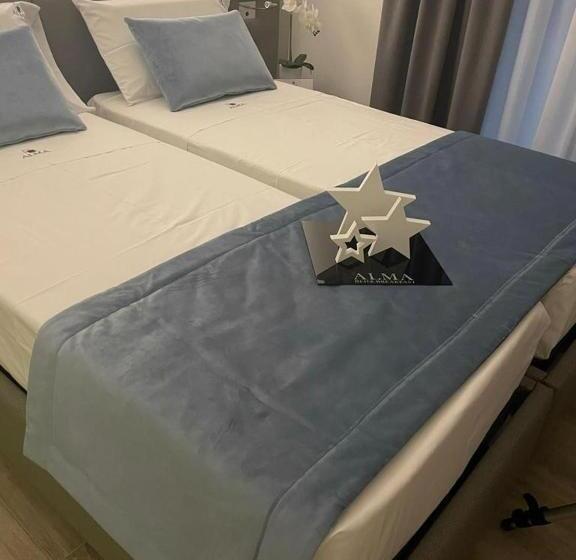 Habitación Deluxe con Balcón, Alma Bed & Breakfast