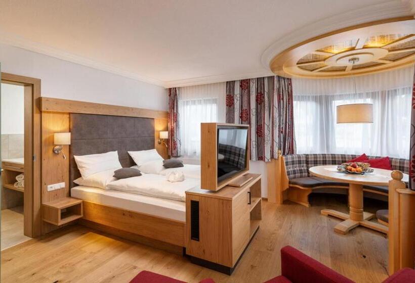 חדר דלוקס, Dorfstube