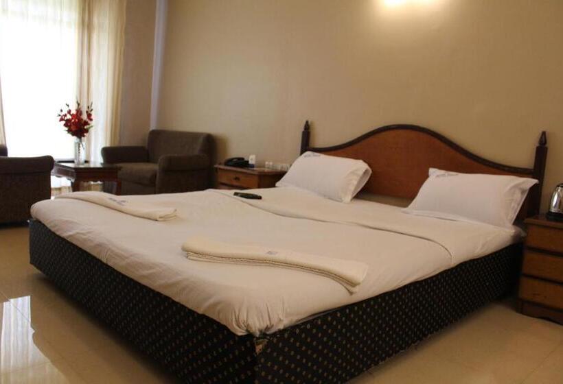 غرفة ديلوكس, Pooja International