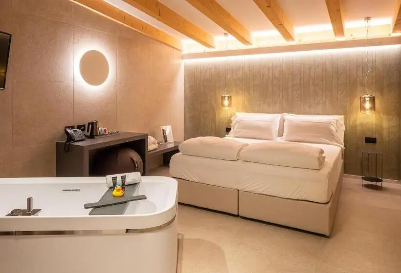デラックスの４人部屋, Relais Limonaia   Suites & Garden Spa