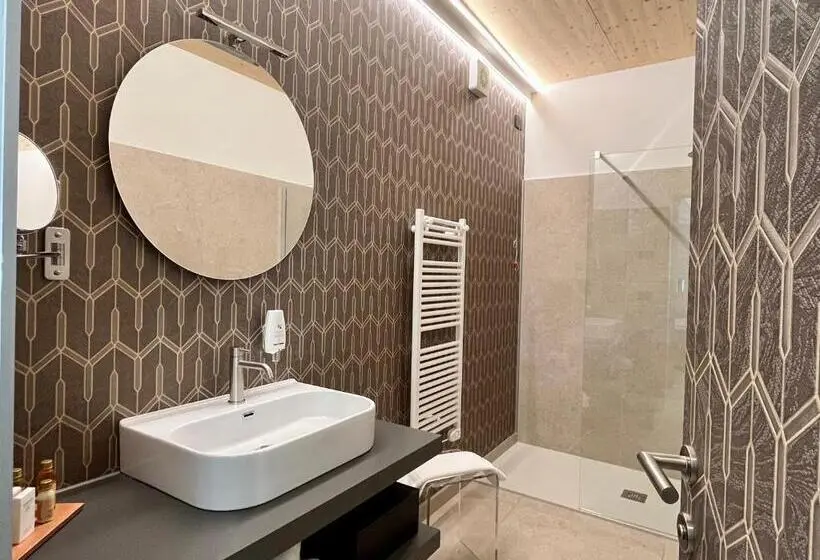 デラックスの４人部屋, Relais Limonaia   Suites & Garden Spa