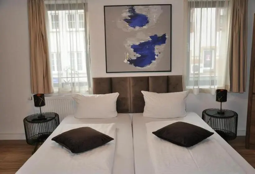Quarto Estandar, A&c