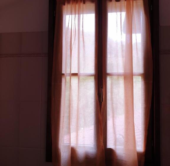 חדר לארבעה סטנדרטי עם נוף לגינה, B&b Il Bagarello