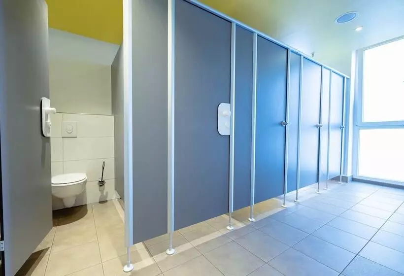 Bed in Shared Room with Shared Bathroom
