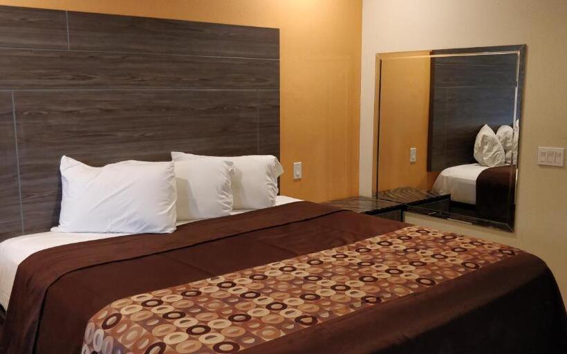 キングサイズベッドのスタンダードルーム, Regency Inn And Suites Galena Park