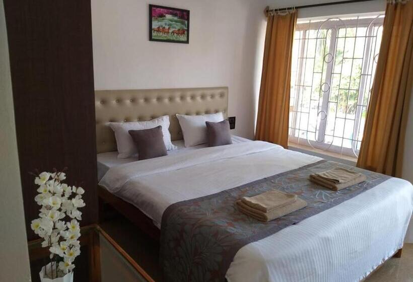 Quarto deluxe, Oasis Beach Resort