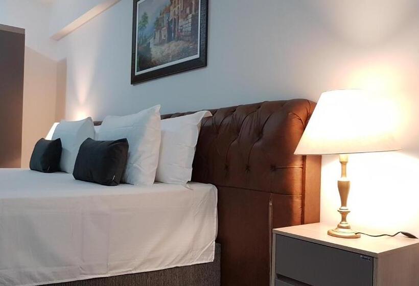 חדר דלוקס עם מיטת קינג, B & A Suites Inn Hotel   Quarto Luxo Gold