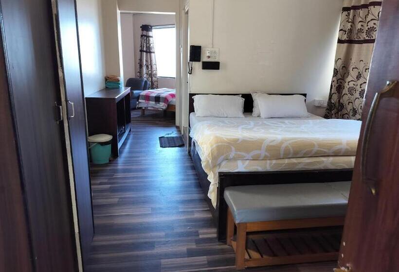 キングサイズベッドのデラックスルーム, The Shillong Hills Guest House