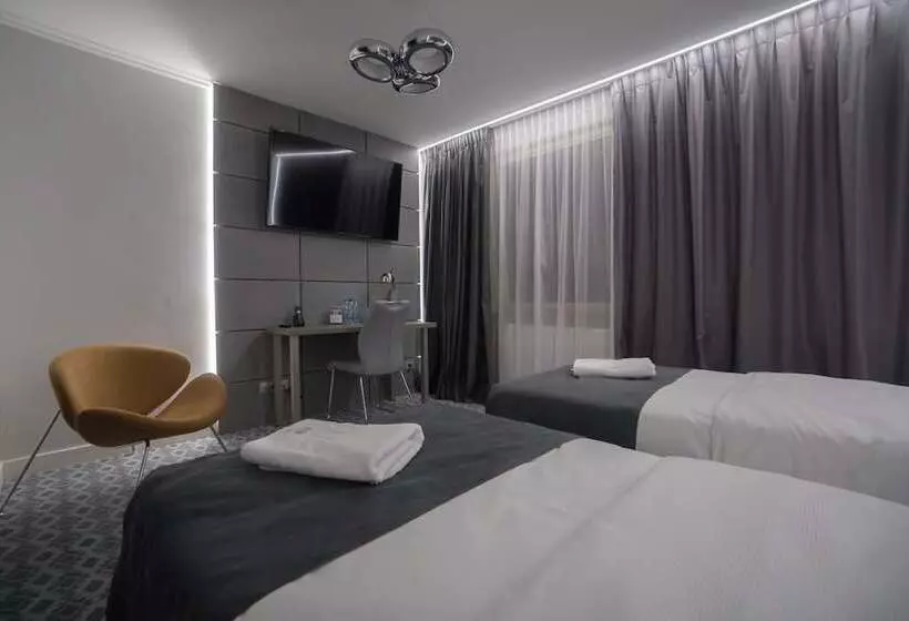 Executive Kolmen Hengen Huone, Gordon