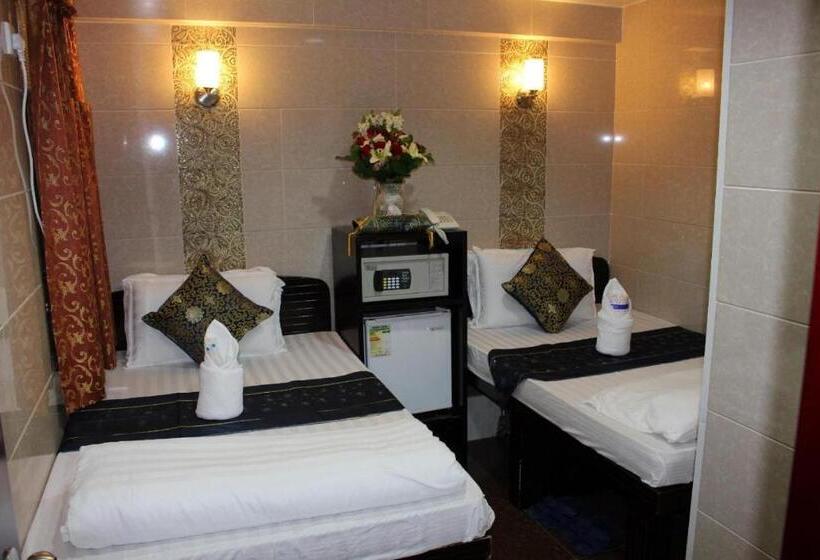 اتاق استاندارد سه نفره, Shangri La Guest House