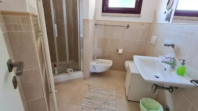 Huoneisto 1 Makuuhuone Allasnäkymä, Residence Borgo Punta Villa