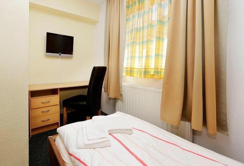 标准单人间共用浴室, Goldener Hahn