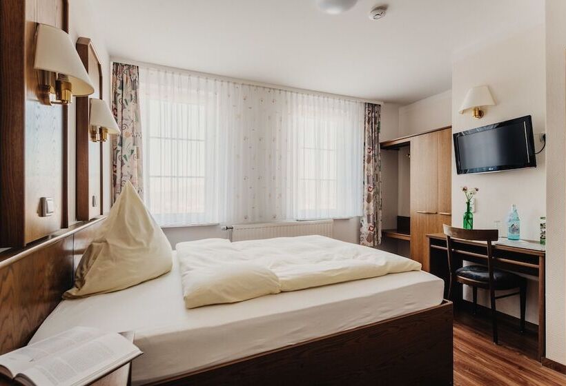 单人经济间, Am Schlehberg