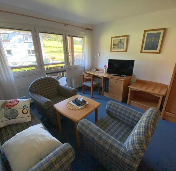 Suíte Júnior com Sacada, Faller