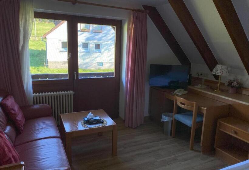 Quarto Superior Vista Jardim, Faller