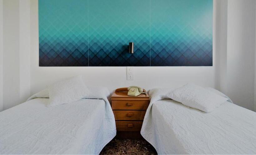 غرفة قياسية فردية, Roig