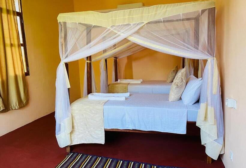 غرفة عائلية مطلّة علي البحر, Maisara Mafia Beach Lodge