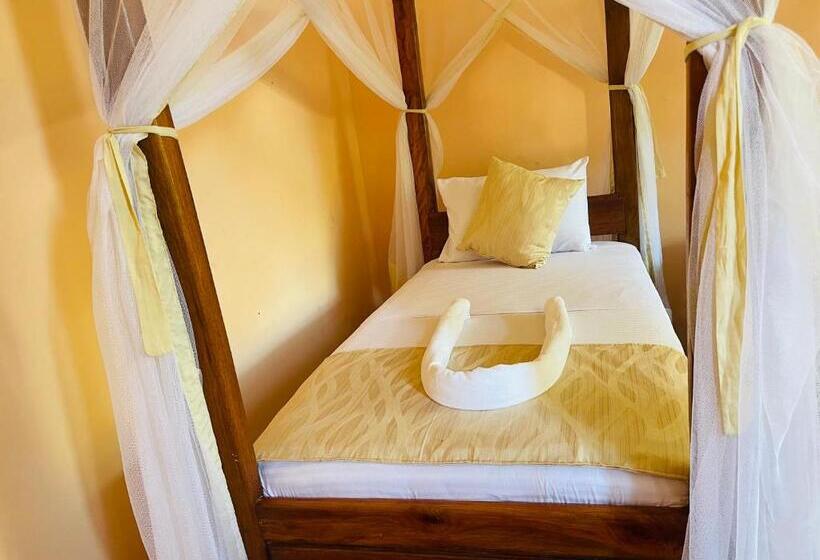 غرفة عائلية مطلّة علي البحر, Maisara Mafia Beach Lodge