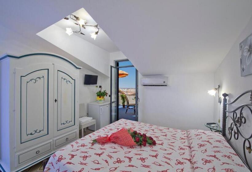 غرفة قياسية رباعية مزودة بشُرفة, L Incanto