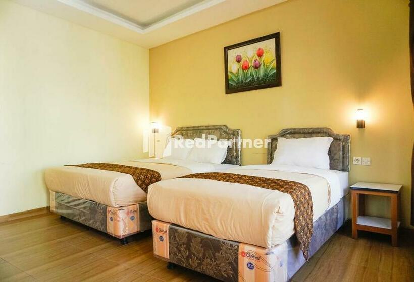 Quarto Triplo Estandar, Griya Imafa Inn Mitra Reddoorz
