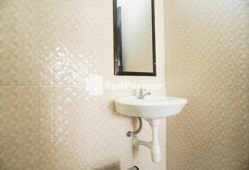 Quarto Triplo Estandar, Griya Imafa Inn Mitra Reddoorz