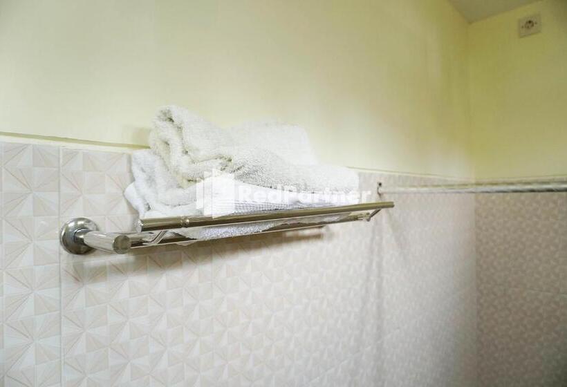 Quarto Triplo Estandar, Griya Imafa Inn Mitra Reddoorz