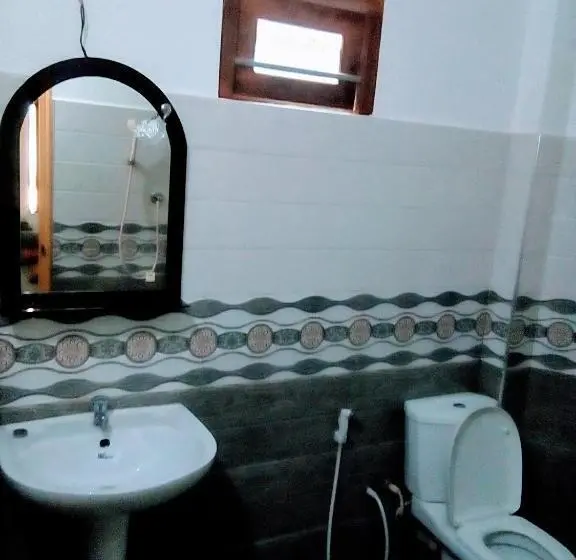 اتاق خانوادگی با چشم‌انداز باغ, Margosa Guesthouse