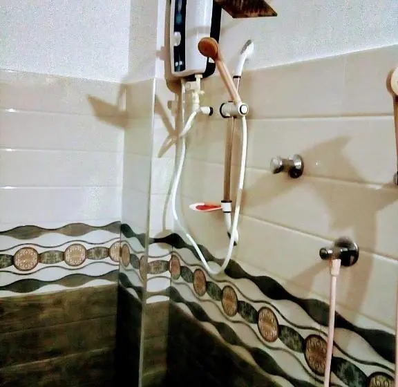 اتاق خانوادگی با چشم‌انداز باغ, Margosa Guesthouse