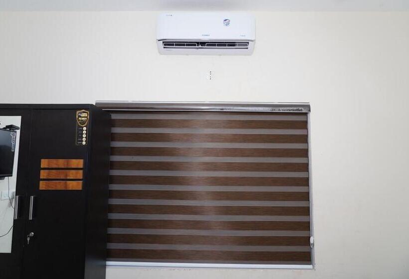 Quarto Deluxe, Atmos Inn Kozhikode