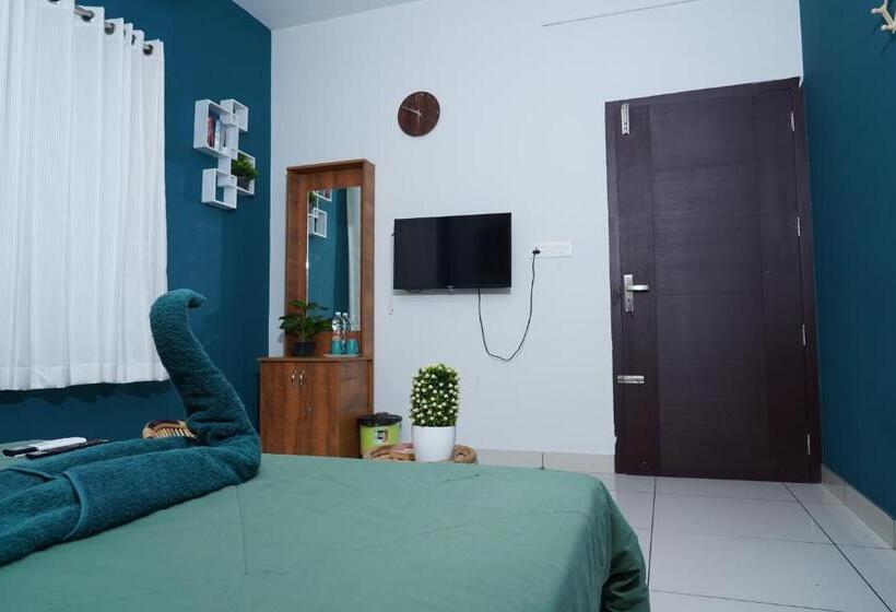 Quarto Superior, Atmos Inn Kozhikode