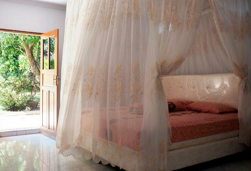 キングサイズベッドのデラックスルーム, Sendowan Baru Amurang