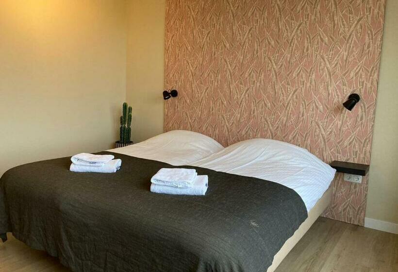 Номер Deluxe, De Horper Wielen