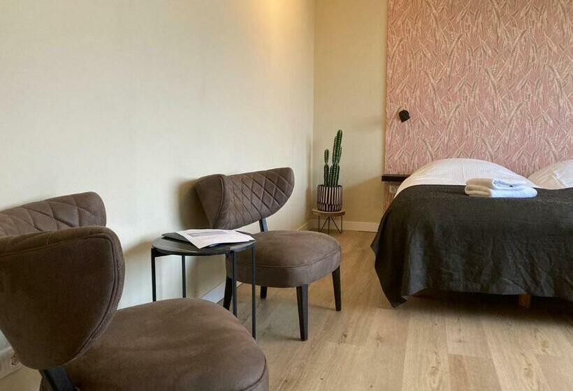 Номер Deluxe, De Horper Wielen