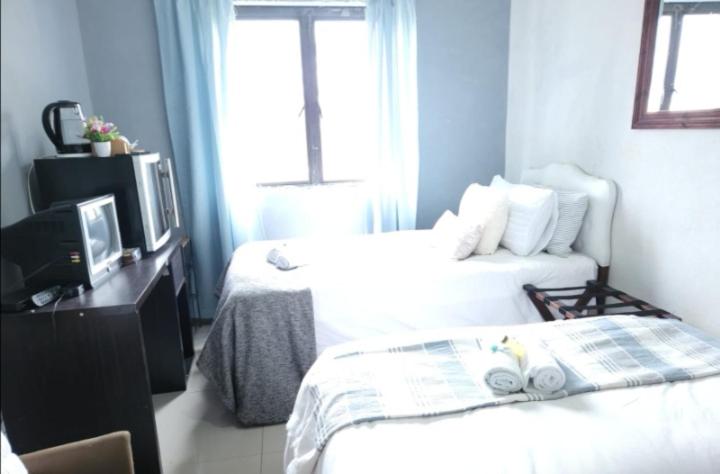 חדר משפחתי חדר אמבטיה משותף, Thokazi Haven Guest House & Backpacker