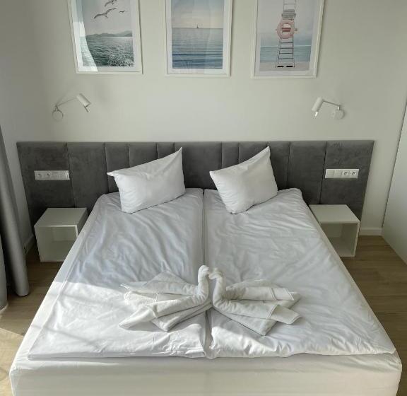 חדר דלוקס, Między Wodami