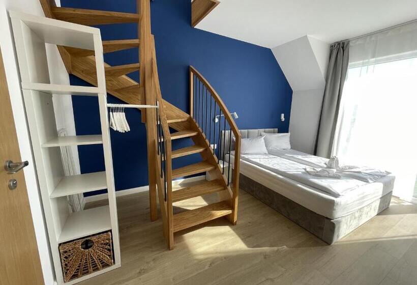 חדר דלוקס לארבעה, Między Wodami