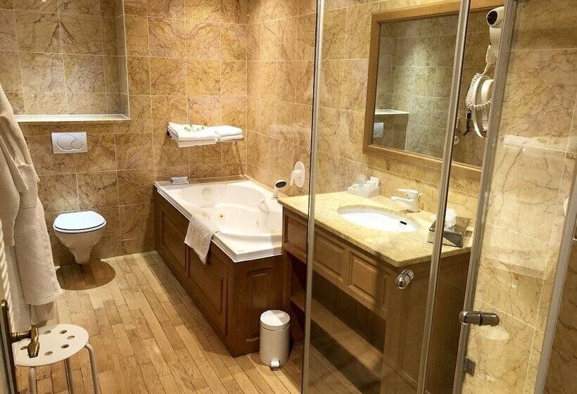Номер Deluxe, D'angleterre