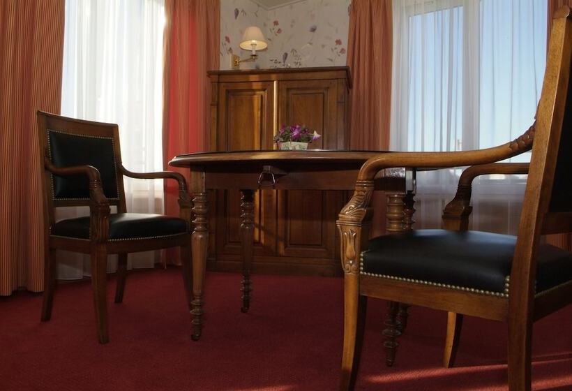 Номер Deluxe, D'angleterre